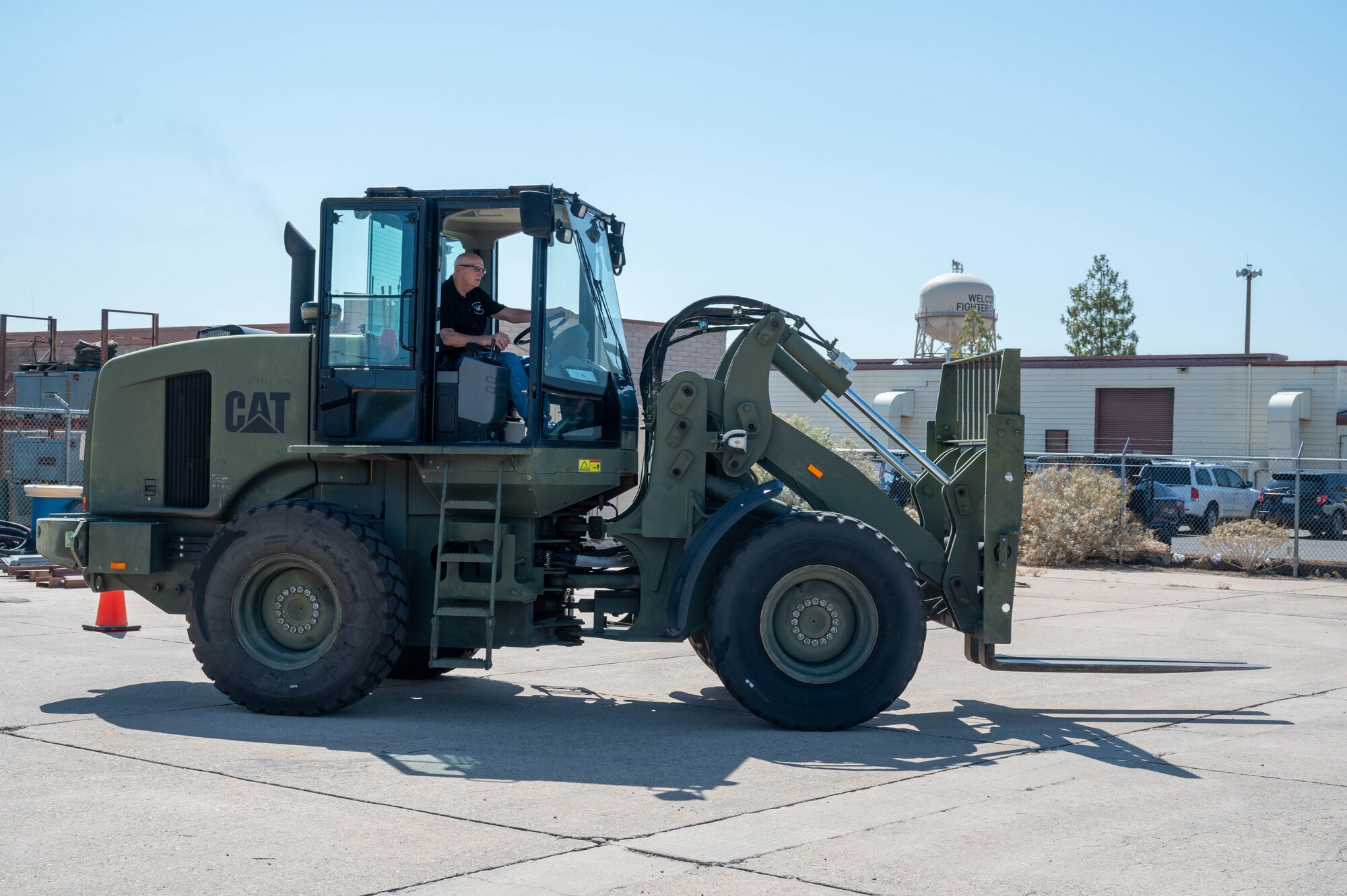 U.S. Air Force retired Senior Master Sgt. Vic Peterson, community advocate, operates a forklift during a tour of the 56th Logistics Readiness Squadron ground transportation flight, Aug. 26, 2024, at Luke Air Force Base, Arizona.