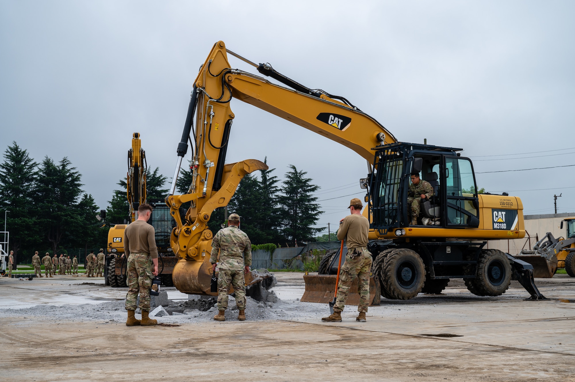 Airmen assigned to the 374th Civil Engineer Squadron participate in a Rapid Airfield Damage Recovery exercise at Yokota Air Base, Japan.