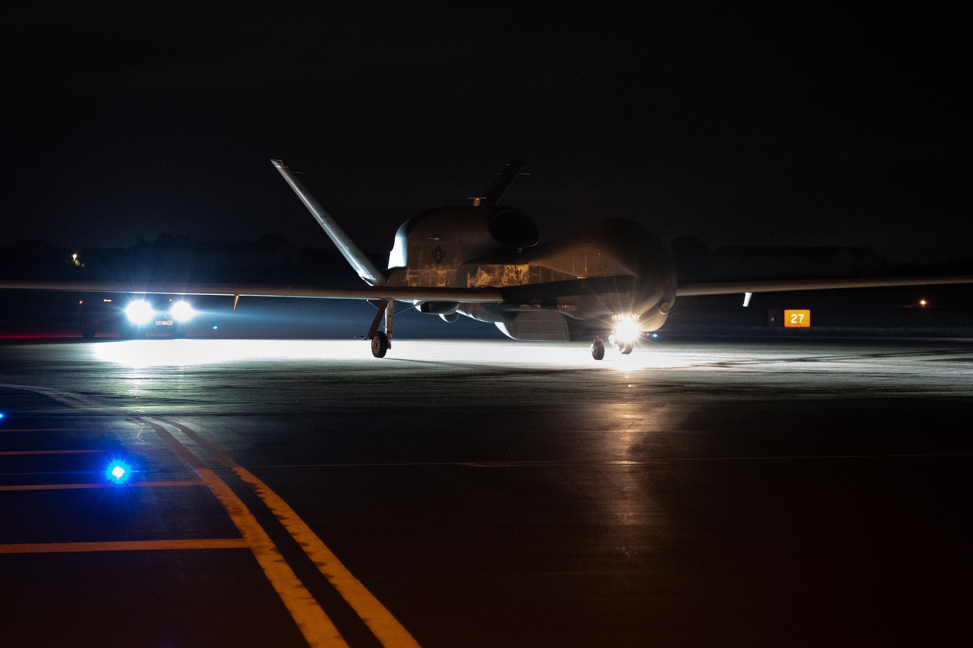 An RQ-4B Global Hawk assigned to Grand Forks Air Force Base’s 319th Reconnaissance Wing taxis down the flightline.