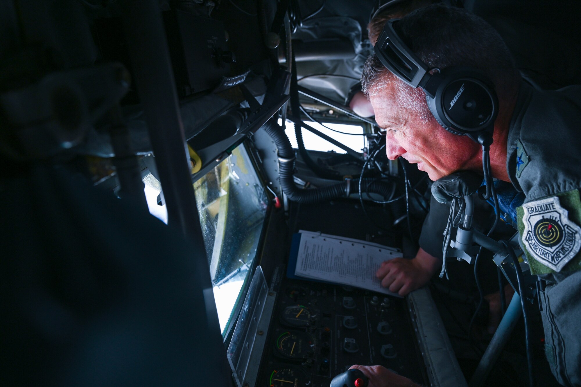 U.S. Air Force Maj. Gen. Gregory Kreuder, 19th Air Force commander, flies a boom during a flight on a KC-135 Pegasus aircraft from San Antonio, Texas, to Altus Air Force Base, Oklahoma, Aug. 22, 2024. During Kreuder’s visit, he gained insight on core aerial refueling capabilities of the aircraft that are essential to the mission at the 97th Air Mobility Wing. (U.S. Air Force photo by Airman 1st Class Jonah Bliss)