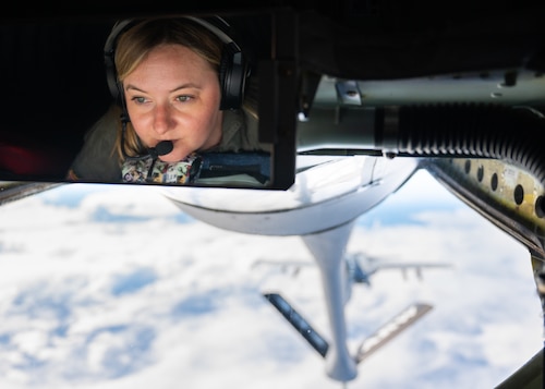 Tech. Sgt. Megan Hatch, a boom operator assigned to the 63rd Air Refueling Squadron, MacDill Air Force Base, Florida, refuels a U.S. Navy FA-18 Super Hornet near Joint Base Pearl Harbor-Hickam as part of Exercise Rim of the Pacific (RIMPAC) 2024, July 18, 2024. Twenty-nine nations, 40 surface ships, three submarines, 14 national land forces, more than 150 aircraft and 25,000 personnel are participating in RIMPAC in and around the Hawaiian Islands, June 27 to Aug. 1. The world's largest international maritime exercise, RIMPAC provides a unique training opportunity while fostering and sustaining cooperative relationships among participants critical to ensuring the safety of sea lanes and security on the world's oceans. RIMPAC 2024 is the 29th exercise in the series that began in 1971. (U.S. Air Force photo by Tech. Sgt. Bradley Tipton)