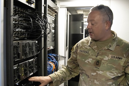 Master Sgt. Clinton Ragsdale inspects radio equipment in the Mobile Command Unit. Soldiers from the Kentucky Army National Guard’s Communication/Information Technology Mission Command mobilized through parts of western Kentucky Aug. 12-16, 2024, for a natural disaster response exercise.