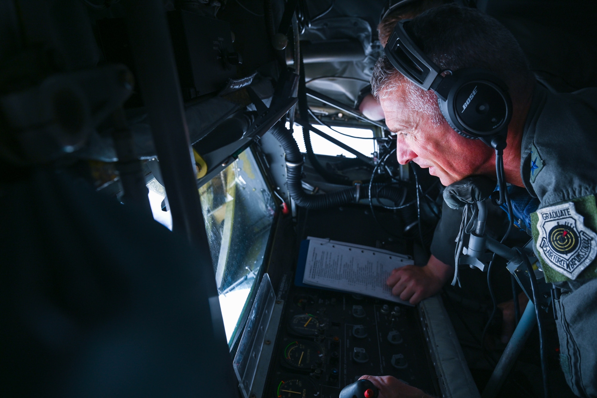 U.S. Air Force Maj. Gen. Gregory Kreuder, 19th Air Force commander, flies a boom during a flight on a KC-135 Pegasus aircraft from San Antonio, Texas, to Altus Air Force Base, Oklahoma, Aug. 22, 2024. During Kreuder’s visit, he gained insight on core aerial refueling capabilities of the aircraft that are essential to the mission at the 97th Air Mobility Wing. (U.S. Air Force photo by Airman 1st Class Jonah Bliss)