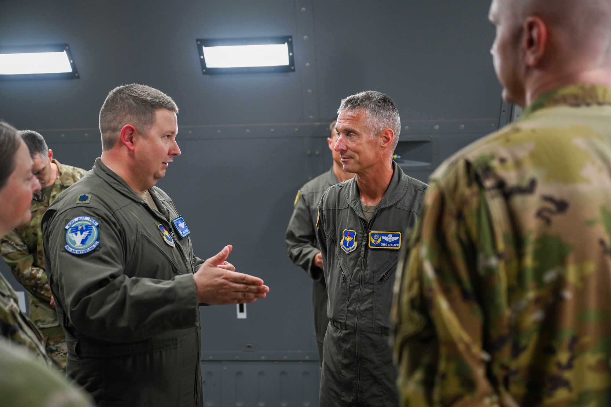U.S. Air Force Lt. Col. Pete Culbert, 56th Air Refueling Squadron commander, left, briefs Maj. Gen. Gregory Kreuder, 19th Air Force (AF) commander, right, inside a KC-46 Pegasus aircraft at Altus Air Force Base (AFB), Oklahoma, Aug. 22, 2024. This was Kreuder’s first visit to Altus AFB as part of the 19th AF command team. (U.S. Air Force photo by Airman 1st Class Jonah Bliss)
