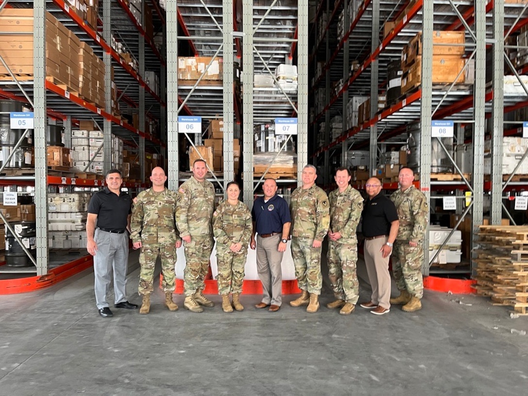 Group of people in a warehouse
