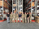 Group of people in a warehouse