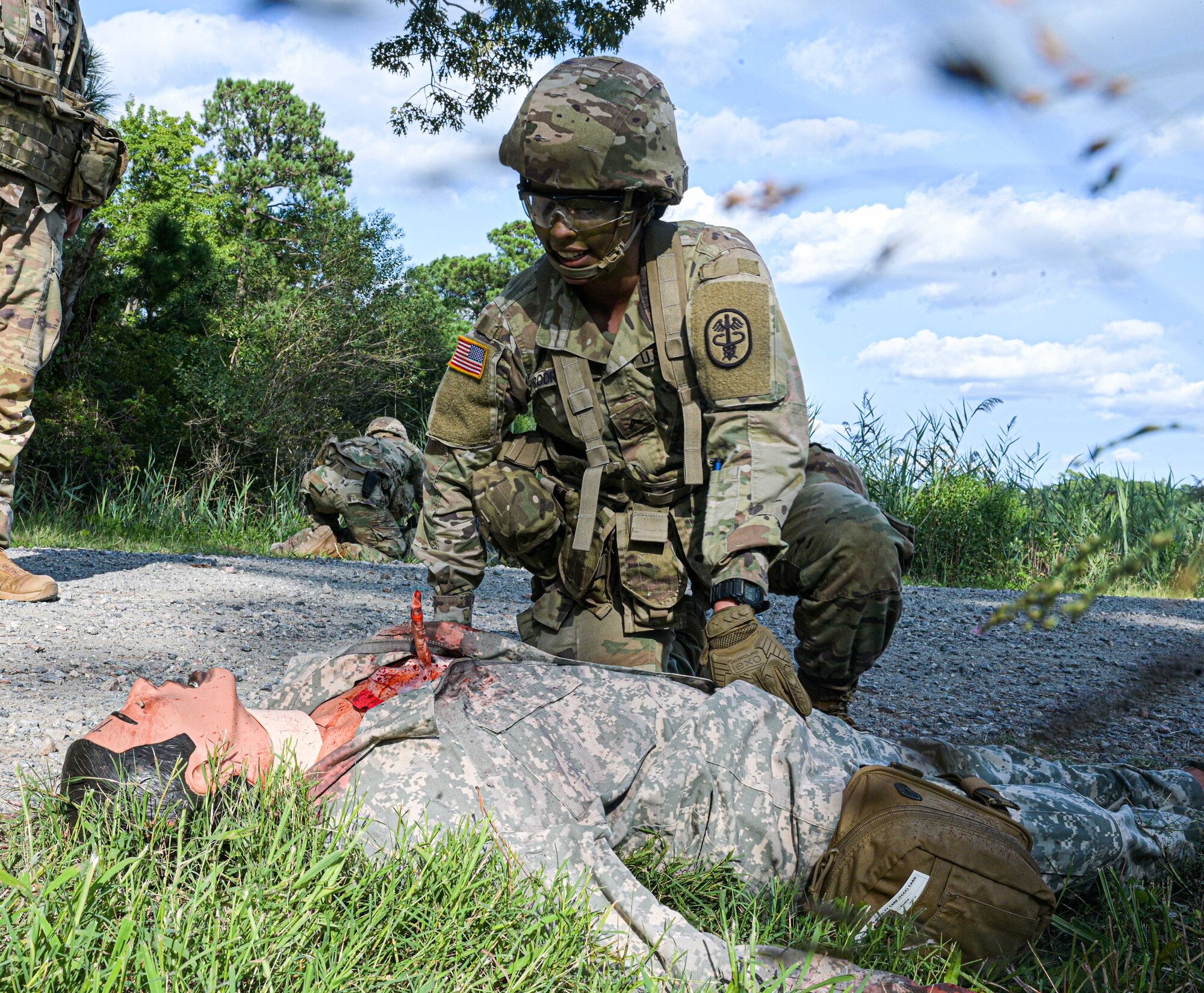 Soldier aids wounded soldier