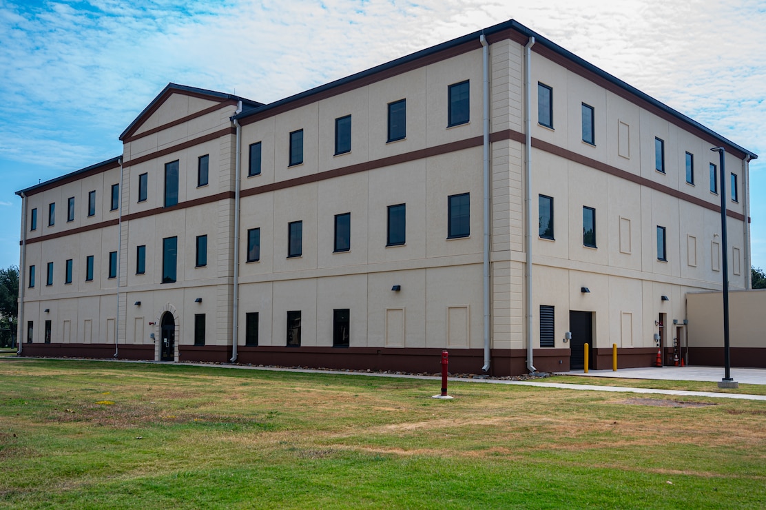 The 2nd Communications Squadron consolidated facility held a ribbon-cutting ceremony to mark the opening of the new location at Barksdale Air Force Base, Aug. 28, 2024. The new building is equipped to handle the increased demands and growing personnel numbers, providing a robust infrastructure to support future operations. (U.S. Air Force photo by Airman 1st Class Aaron Hill)