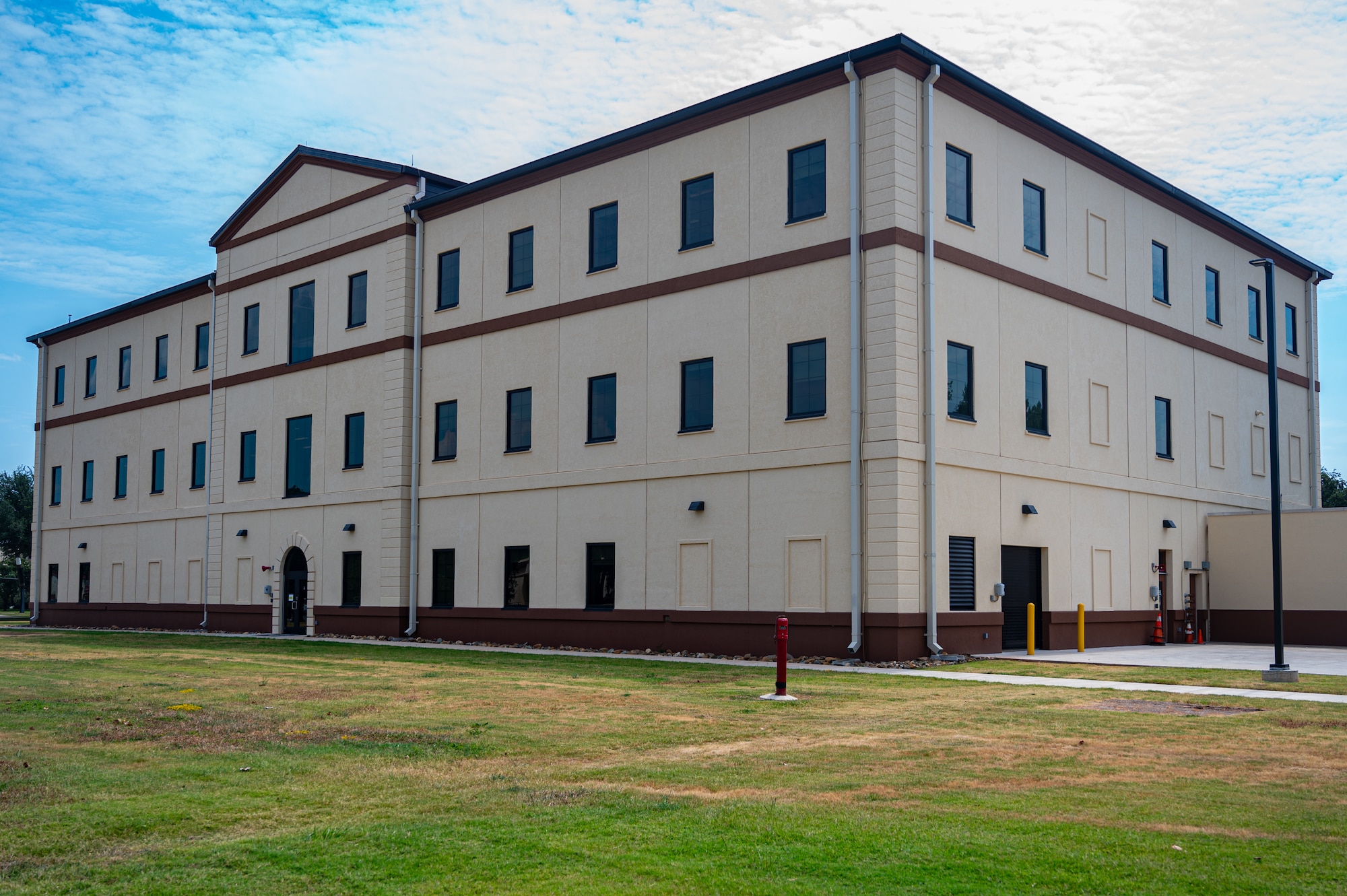 The 2nd Communications Squadron consolidated facility held a ribbon-cutting ceremony to mark the opening of the new location at Barksdale Air Force Base, Aug. 28, 2024. The new building is equipped to handle the increased demands and growing personnel numbers, providing a robust infrastructure to support future operations. (U.S. Air Force photo by Airman 1st Class Aaron Hill)