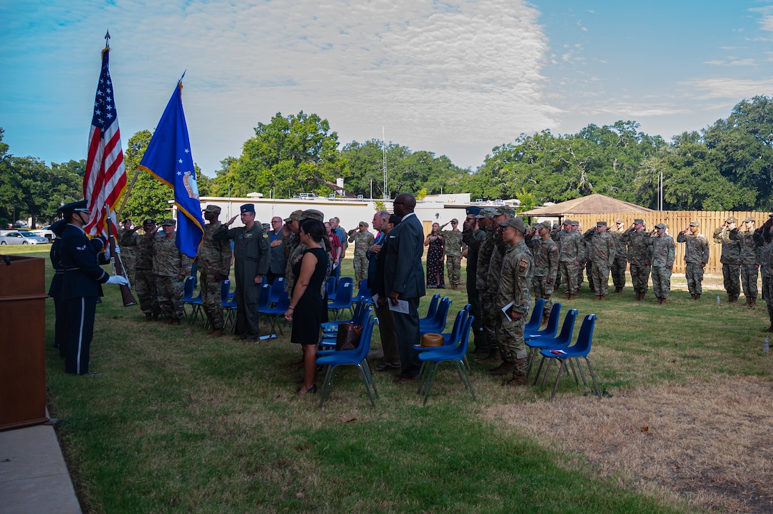 Airmen and guests attend a ribbon-cutting ceremony for the new 2nd Communications Squadron consolidated facility at Barksdale Air Force Base, Aug. 28, 2024. The new communications building marks a significant upgrade for the squadron, replacing old, deteriorating structures with a modern facility. (U.S. Air Force photo by Airman 1st Class Aaron Hill)