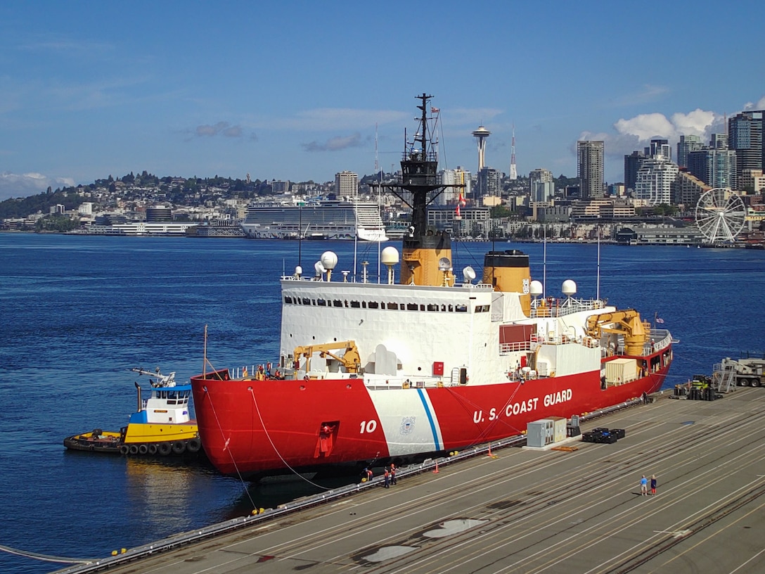 U.S. Coast Guard Cutter Polar Star (WAGB 10) is pushed by assist tugboats into a pier at Coast Guard Base Seattle, Aug. 25, 2024. The crew returned to their homeport following a several-month dry-dock period in California. (U.S. Coast Guard photo by Lt. Chris Butters)