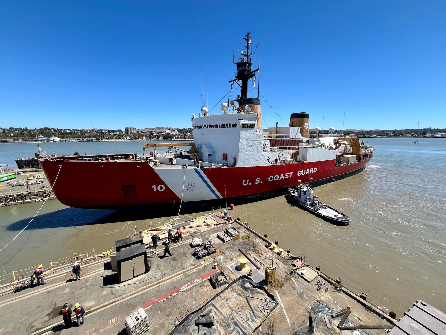 The U.S. Coast Guard Cutter Polar Star (WAGB 10) is backed out of a dry dock facility in Vallejo, California, after the cutter underwent maintenance, Aug. 15, 2024.The months-long maintenance was part of the in-service vessel sustainment program with the goal of recapitalizing targeted systems, including propulsion, communication, and machinery control systems, as well as effecting significant maintenance to extend the cutter’s service life. U.S. Coast Guard photo by Lt. Megan Rice.