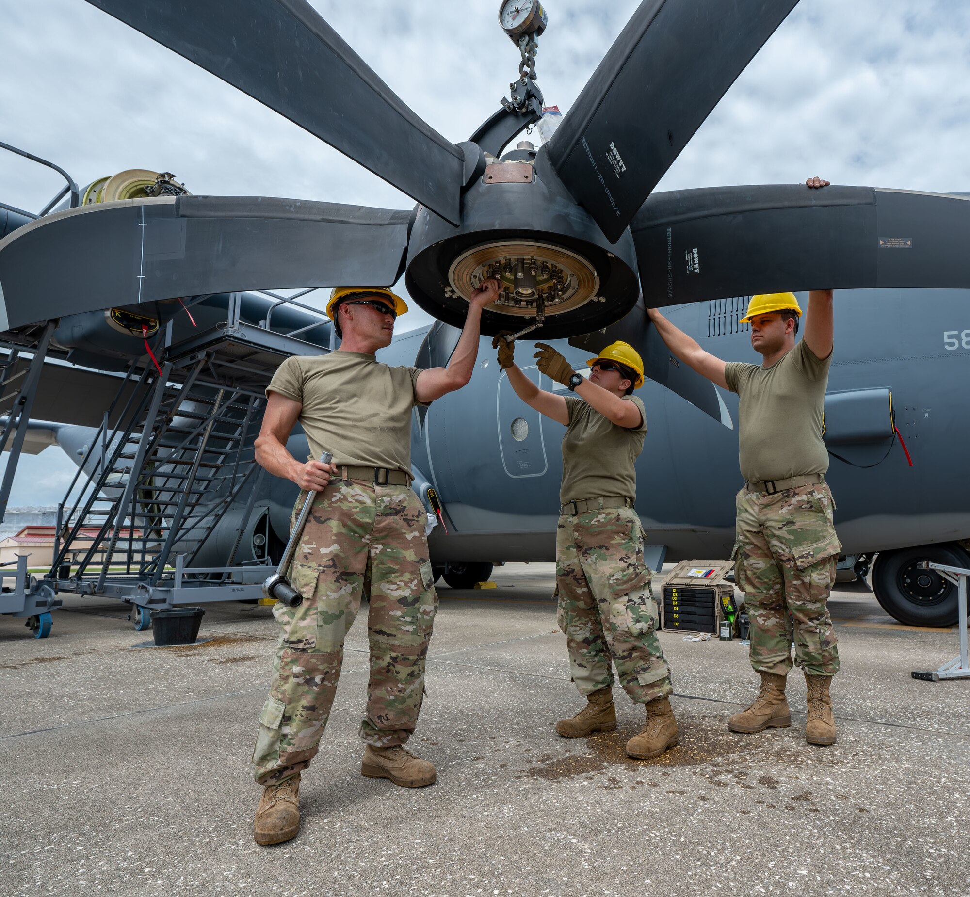 Combat rescue Engine Specialist prepare a propeller for installation