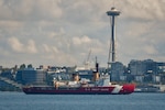 U.S. Coast Guard Cutter Polar Star (WAGB 10) transits Elliott Bay near the Seattle waterfront as the cutter approaches its homeport of Coast Guard Base Seattle, Aug. 25, 2024. At a length of 399-feet, the Polar Star is one of the largest cutters in the Coast Guard's fleet. (U.S. Coast Guard photo by Capt. Holly Harrison)