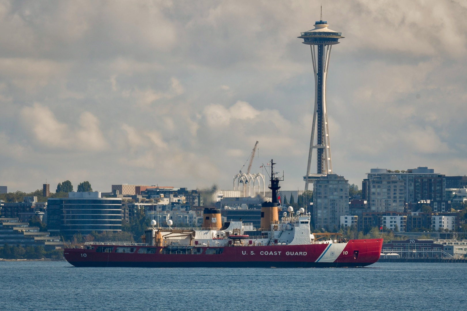 U.S. Coast Guard Cutter Polar Star (WAGB 10) transits Elliott Bay near the Seattle waterfront as the cutter approaches its homeport of Coast Guard Base Seattle, Aug. 25, 2024. At a length of 399-feet, the Polar Star is one of the largest cutters in the Coast Guard's fleet. (U.S. Coast Guard photo by Capt. Holly Harrison)