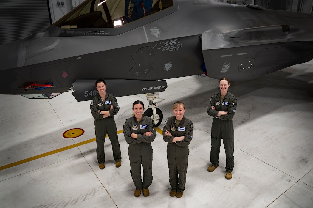 From left to right, U.S. Air Force Capts. Mariah “Claws” Althaus, Ashley “Arizona” Leonard, Analise “Hype” Howard, and Rachel “Savior” Self, F-35 Lightning II pilots assigned to the 355th Fighter Squadron, pose for a photo