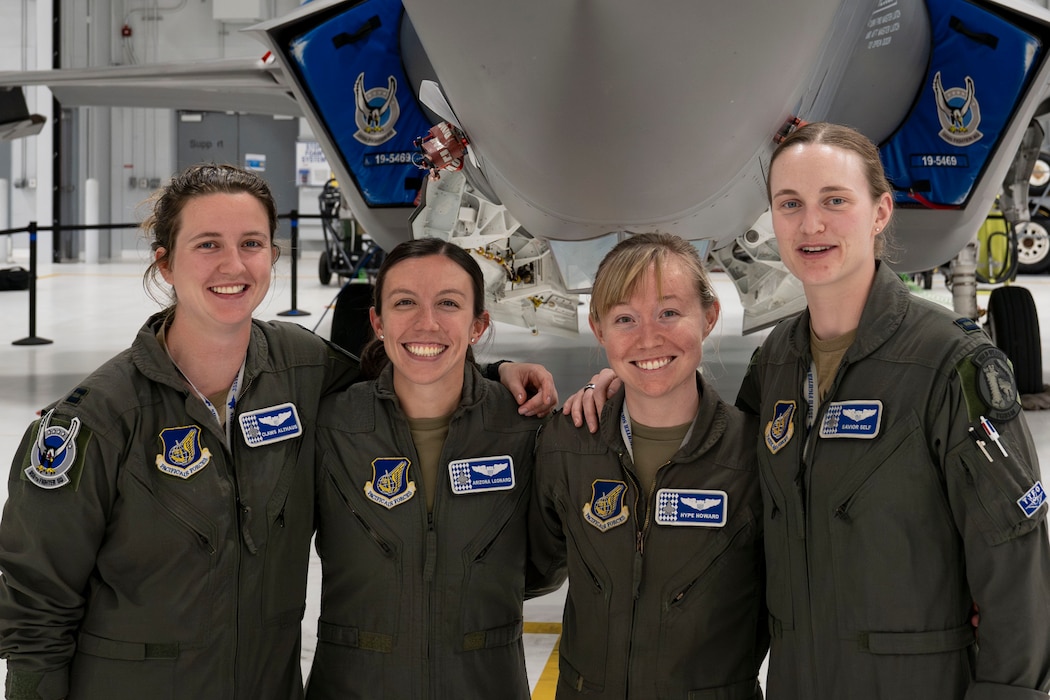 From left to right, U.S. Air Force Capts. Mariah “Claws” Althaus, Ashley “Arizona” Leonard, Analise “Hype” Howard, and Rachel “Savior” Self, 355th Fighter Squadron F-35 Lightning II pilots, pose for a photo during Red Flag-Alaska 24-3,