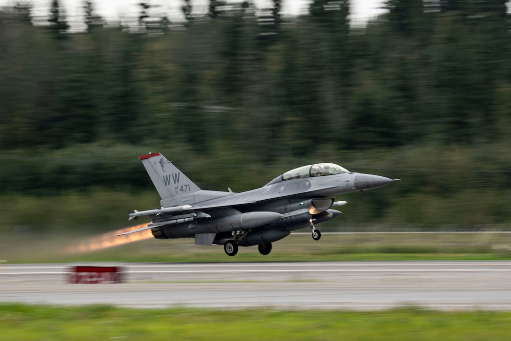 A U.S. Air Force F-16 Fighting Falcon, assigned to the 13th Fighter Squadron, Misawa Air Base, Japan, takes off