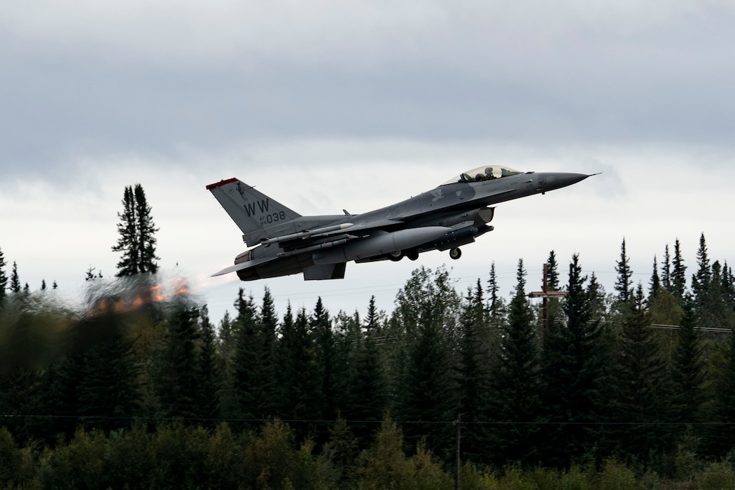 A U.S. Air Force F-16 Fighting Falcon, assigned to the 13th Fighter Squadron, Misawa Air Base, Japan, takes off during