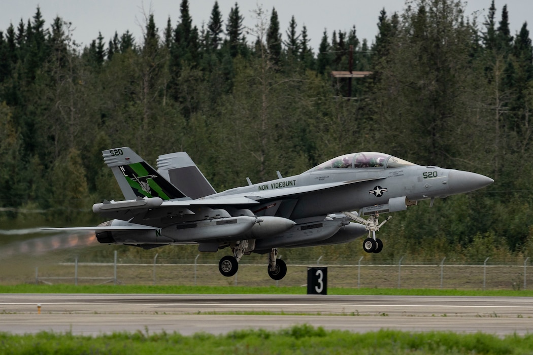 A U.S. Navy EA-18G Growler, assigned to the Electronic Attack Squadron 135 (VAQ-135) “Black Ravens”, takes off during Red Flag-Alaska 24-3