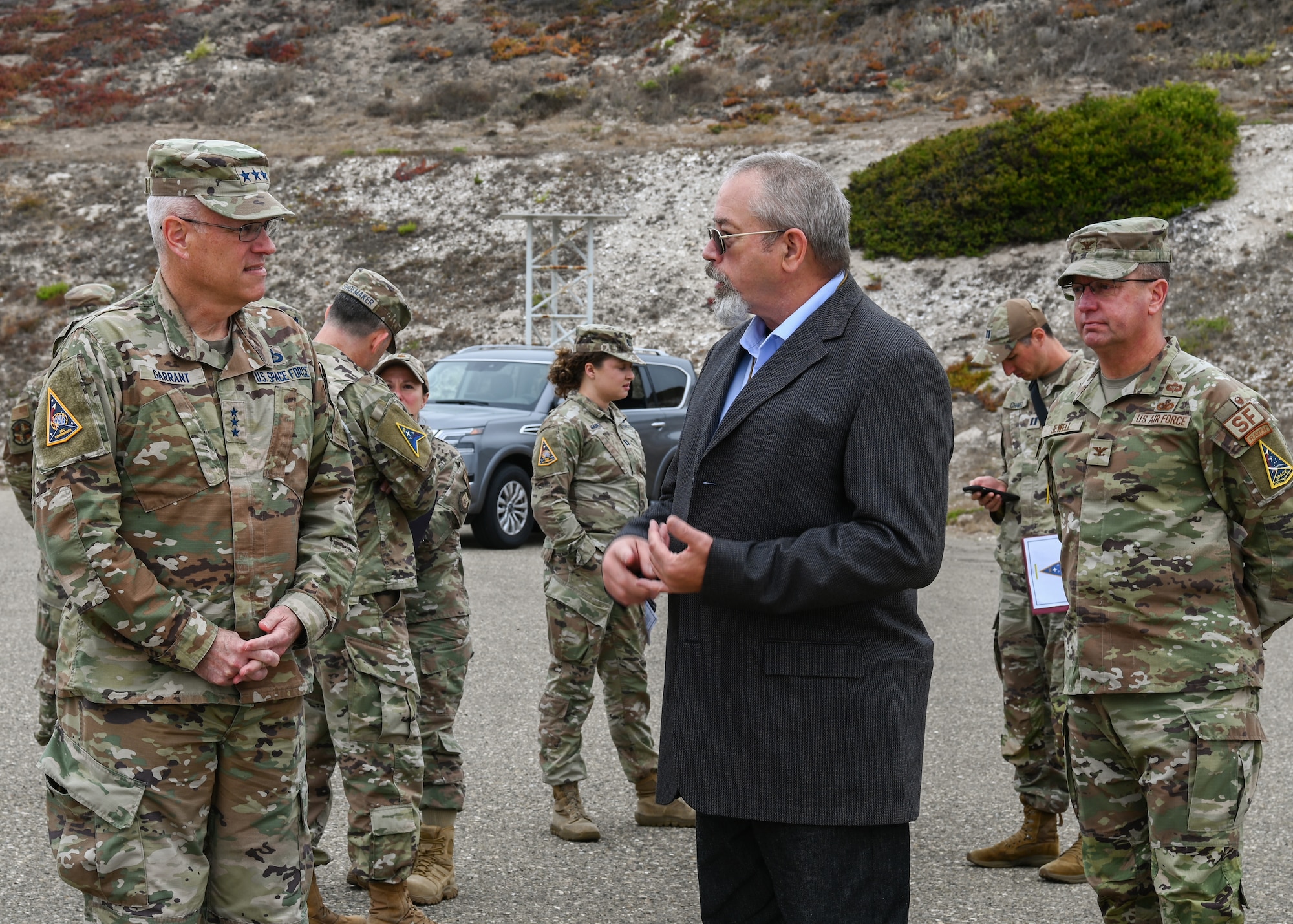 A Space Systems Command commander, speaks with the Vandenberg Space Force Base Ground-Based Midcourse Defense Operations director about Guardian Nexus during a tour of Launch Facility-4 at Vandenberg Space Force Base.
