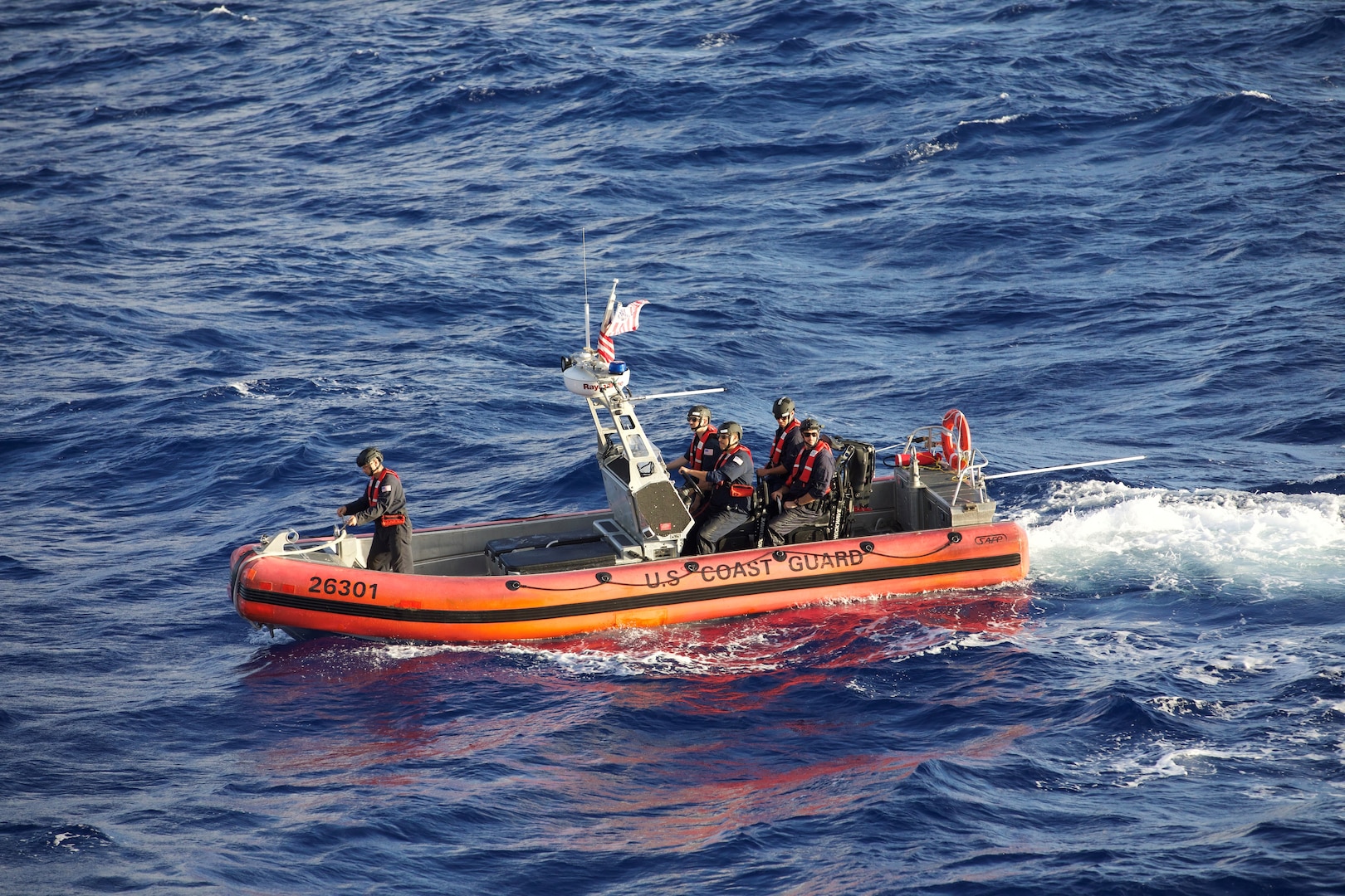 A Coast Guard Cutter Campbell (WMEC 909) small boat crew conducts at-sea training aboard a 26’ over-the-horizon cutter boat, Aug. 13, 2024, while underway in the Windward Passage. Campbell’s crew deployed for a 73-day patrol to conduct maritime safety and security missions in the region. (U.S. Coast Guard photo by Master Chief Petty Officer Robert Zergman)