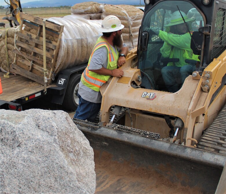U.S. Army Corps of Engineers Los Angeles District contractors stage equipment and supplies in preparation for construction on the new South Wilmot Gate project following the groundbreaking ceremony Aug. 22 at Davis-Monthan Air Force Base in Arizona. These projects are being executed by USACE in coordination with Air Force’s 355th Civil Engineer Squadron.