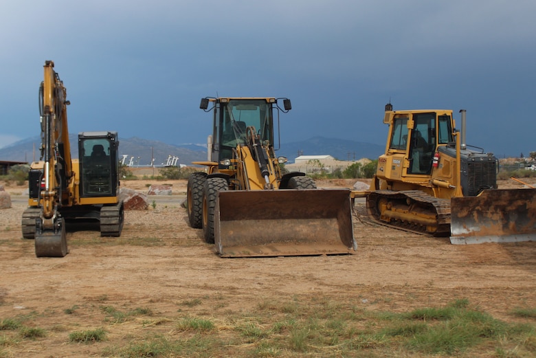 U.S. Army Corps of Engineers Los Angeles District contractors stage equipment and supplies in preparation for construction on the new South Wilmot Gate project following the groundbreaking ceremony Aug. 22 at Davis-Monthan Air Force Base in Arizona. These projects are being executed by USACE in coordination with Air Force’s 355th Civil Engineer Squadron.