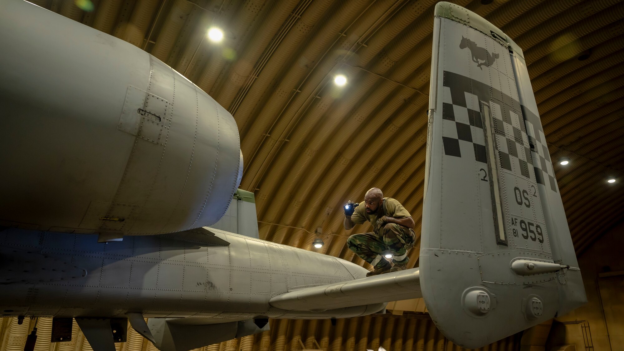 U.S. Air Force Staff Sgt. Trevion Bass, 25th Fighter Generation Squadron dedicated crew chief, inspects an A-10 Thunderbolt II during Ulchi Freedom Shield 24, at Osan Air Base, Republic of Korea, Aug. 22, 2024. UFS24 is an annual combined exercise conducted in support of the U.S.-ROK Mutual Defense Treaty that highlights the U.S. ironclad commitment to the alliance. (U.S. Air Force photo by Senior Airman Sabrina Fuller-Judd)