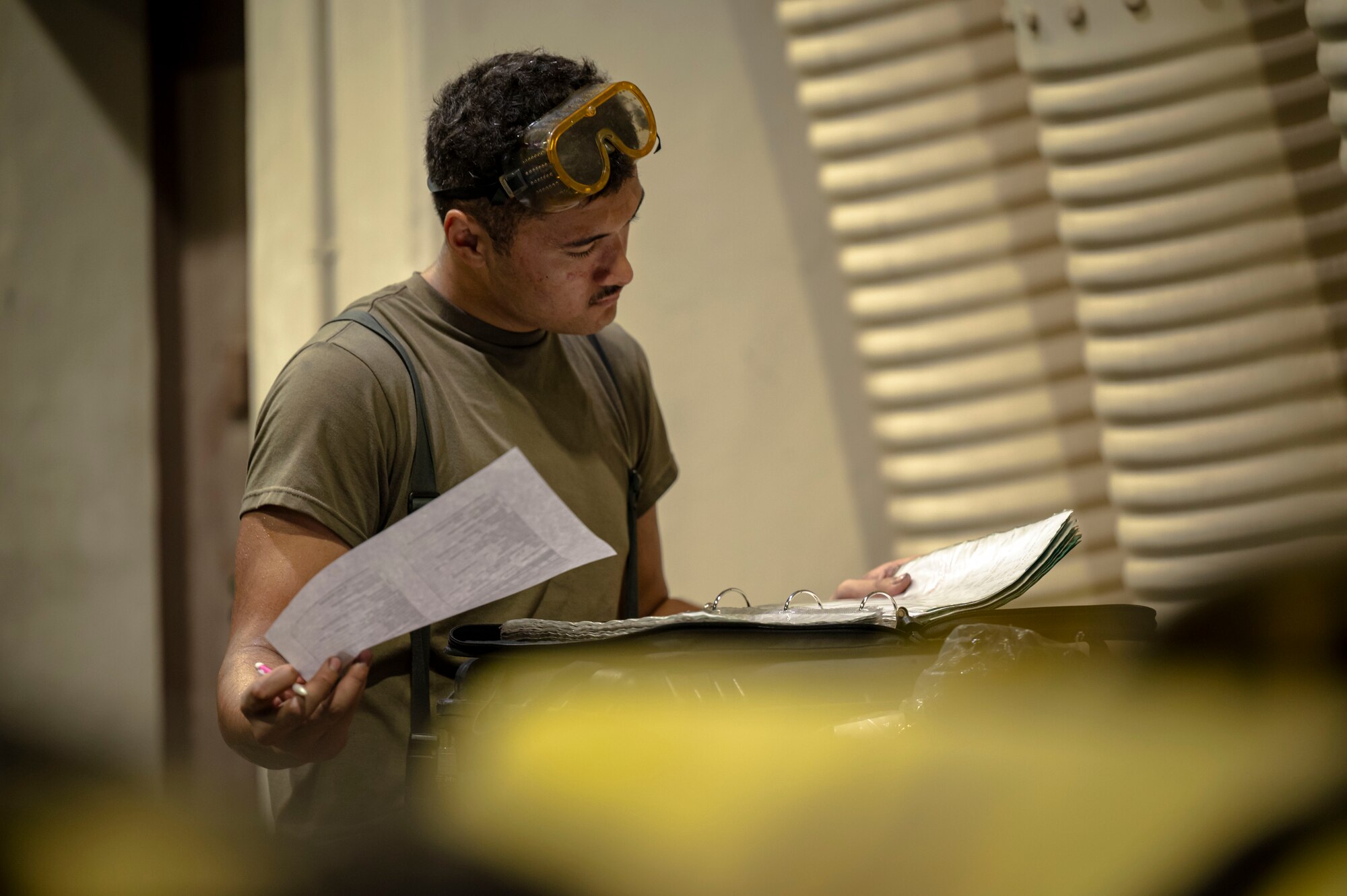 U.S. Air Force Airman 1st Class Mati Jonah, 25th Fighter Generation Squadron assistant dedicated crew chief, reviews maintenance logs for an A-10 Thunderbolt II during Ulchi Freedom Shield 24, at Osan Air Base, Republic of Korea, Aug. 22, 2024. UFS 24 is an annual combined exercise conducted in support of the U.S.-ROK Mutual Defense Treaty that highlights the U.S. ironclad commitment to the alliance. (U.S. Air Force photo by Senior Airman Sabrina Fuller-Judd)