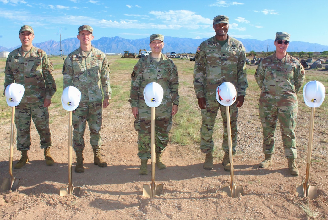 Military leaders pose for a photo following the new South Wilmot Gate project groundbreaking ceremony Aug. 23 at Davis-Monthan Air Force Base in Arizona. The $15 million project will include a vehicle inspection facility and updated security measures, while easing traffic flow in and out of the installation.