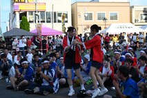Students from Misawa Shogyo High School receive recognition during the Misawa City Festival at Misawa City.