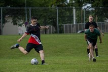 U.S. Airmen compete in a soccer match during Wing Sports day at Misawa Air Base.
