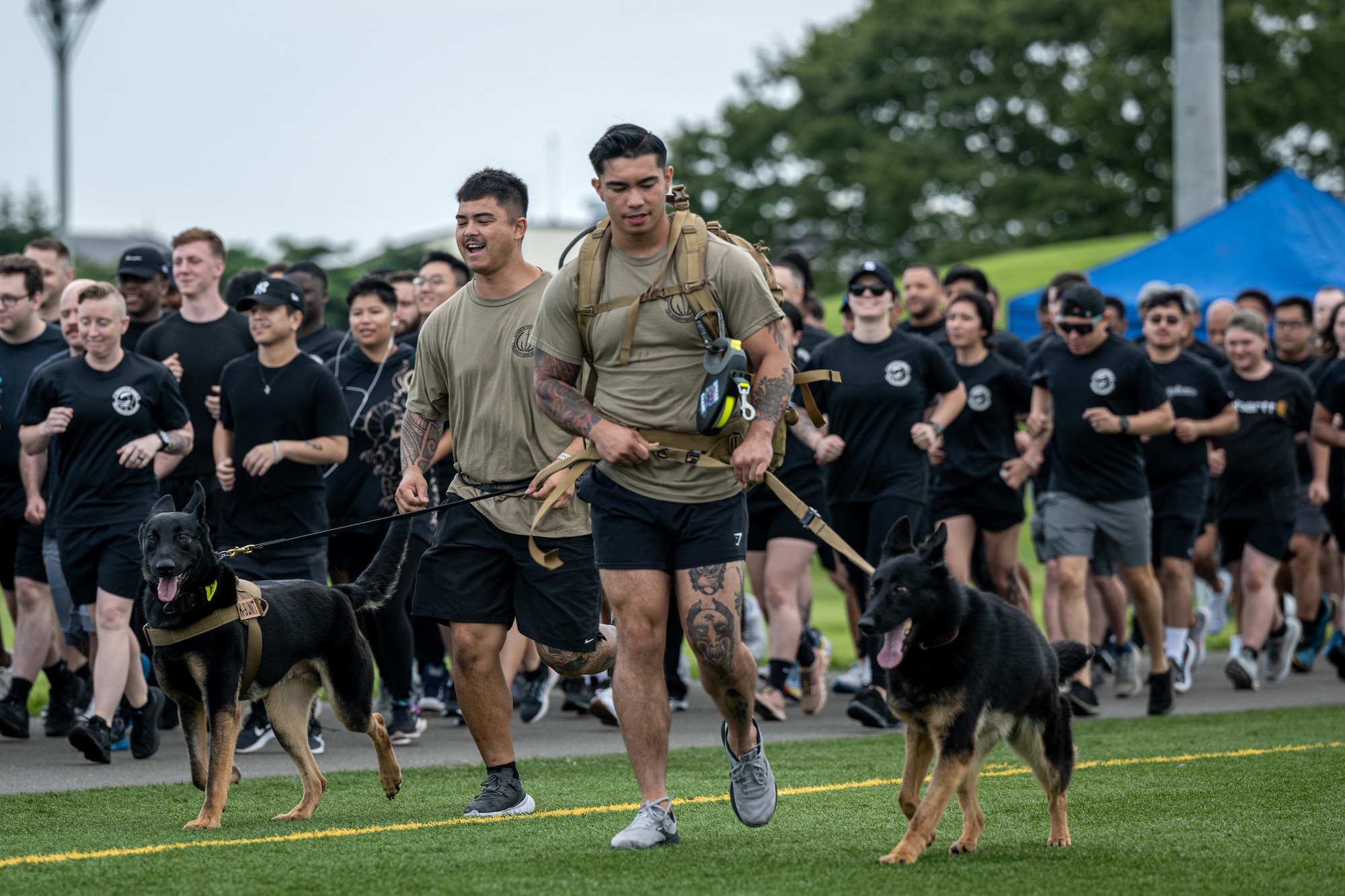Airmen from the 35th Security Forces Squadron participate in the inaugural run of Wing Sports Day at Misawa Air Base.