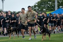 Airmen from the 35th Security Forces Squadron participate in the inaugural run of Wing Sports Day at Misawa Air Base.