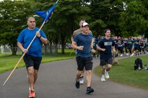 Leadership from the 35th Fighter Wing inaugurate Wing Sports Day with a two-lap run at Misawa Air Base