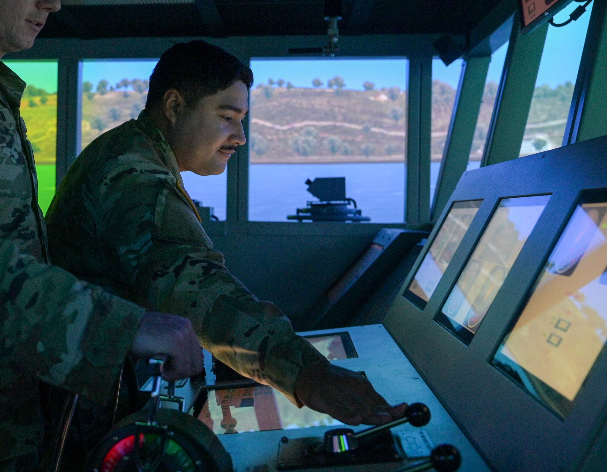 Soldier operating a ship simulator