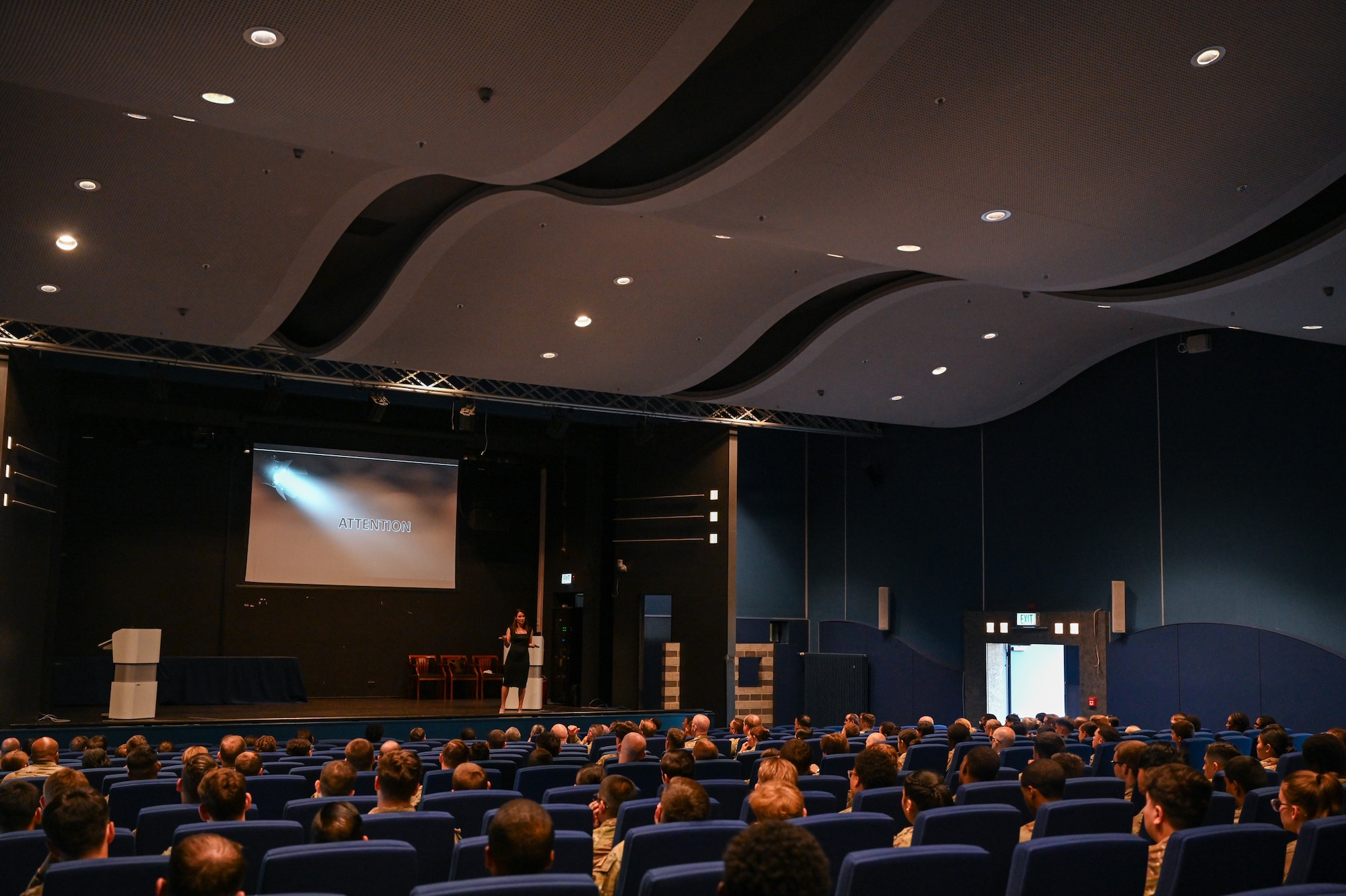 Dr. Jannell MacAulay, a strategic health and human performance specialist, gives a Warrior Heart keynote speech to Airmen assigned to the 521st Air Mobility Operations Wing, August 29, 2024, at the Herc Theater on Ramstein Air Base, Germany.