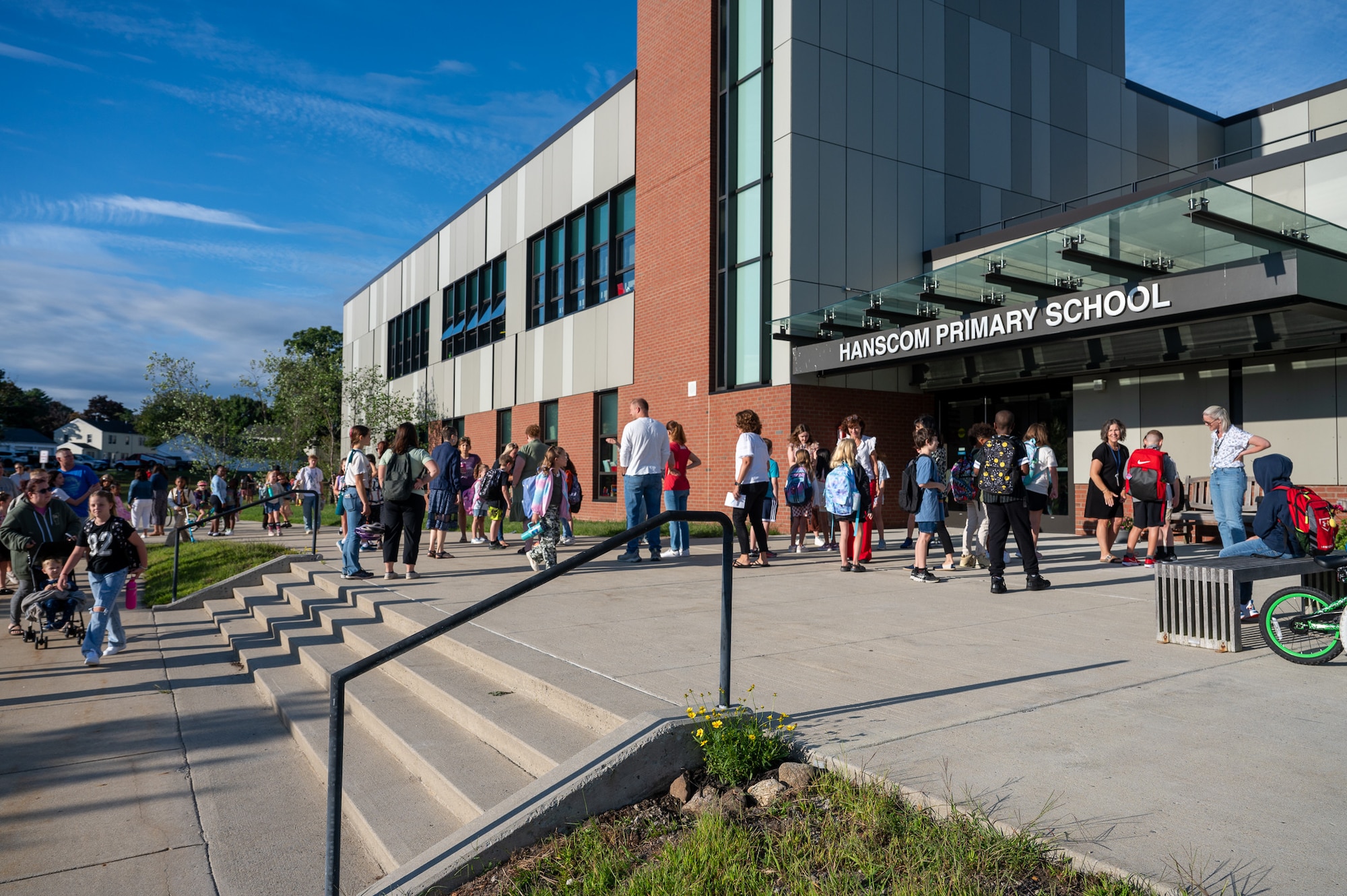 image of children walking into school on the first day of classes.