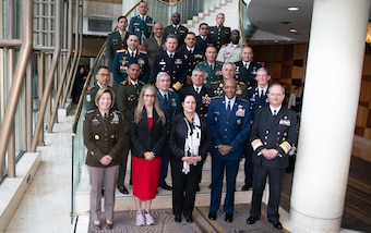 A group photo of multinational military personnel.