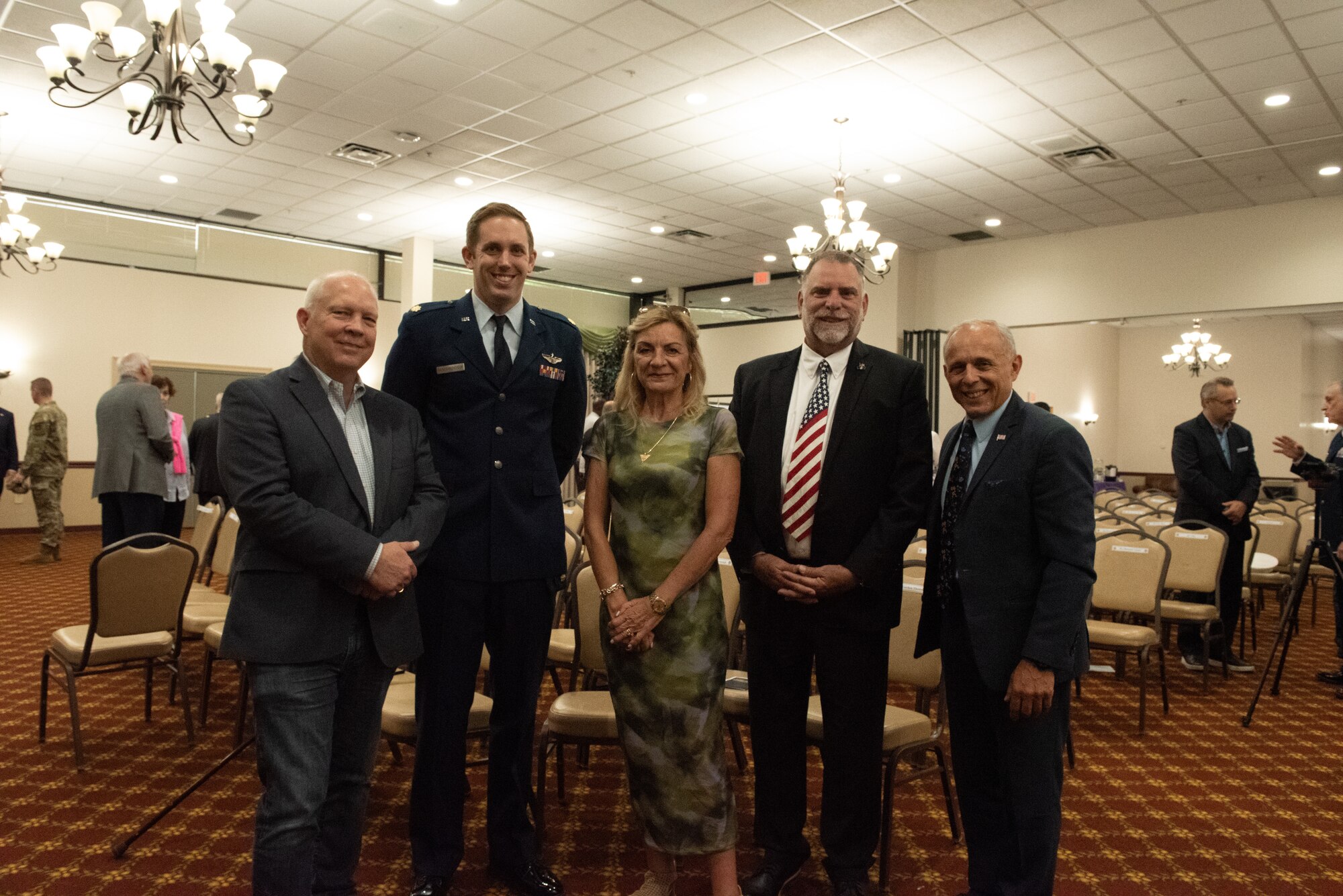 Honorary Commanders pose for a photo at the 2024 JB MDL Honorary Commander Induction Ceremony on Aug 2, 2024. The mission of the Honorary Commanders Program is twofold; one, to educate key community leaders about a unit’s mission and to foster a supportive relationship with the community, increase military involvement in civic endeavors and organizations and make members of the local community feel part of the unit. (U.S. Air Force by Jiahao-Jerry Lai)