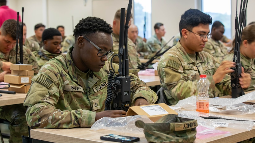 U.S. Army Pfc. Shandreona Rainey, an infantryman assigned to the 10th Mountain Division (Light Infantry), operates new radio equipment during a training exercise on AN/PRC 14 Delta and AN/PRC 170 radios at Mihail Kogălniceanu Airbase, Romania, Aug. 28-29, 2024. 10th MTN Div. (LI) continuously stays updated on the newest technology, as this is crucial in maintaining tactical advantage and seamless coordination during operations. (U.S. Army photo by Pfc. Jason Sessions)