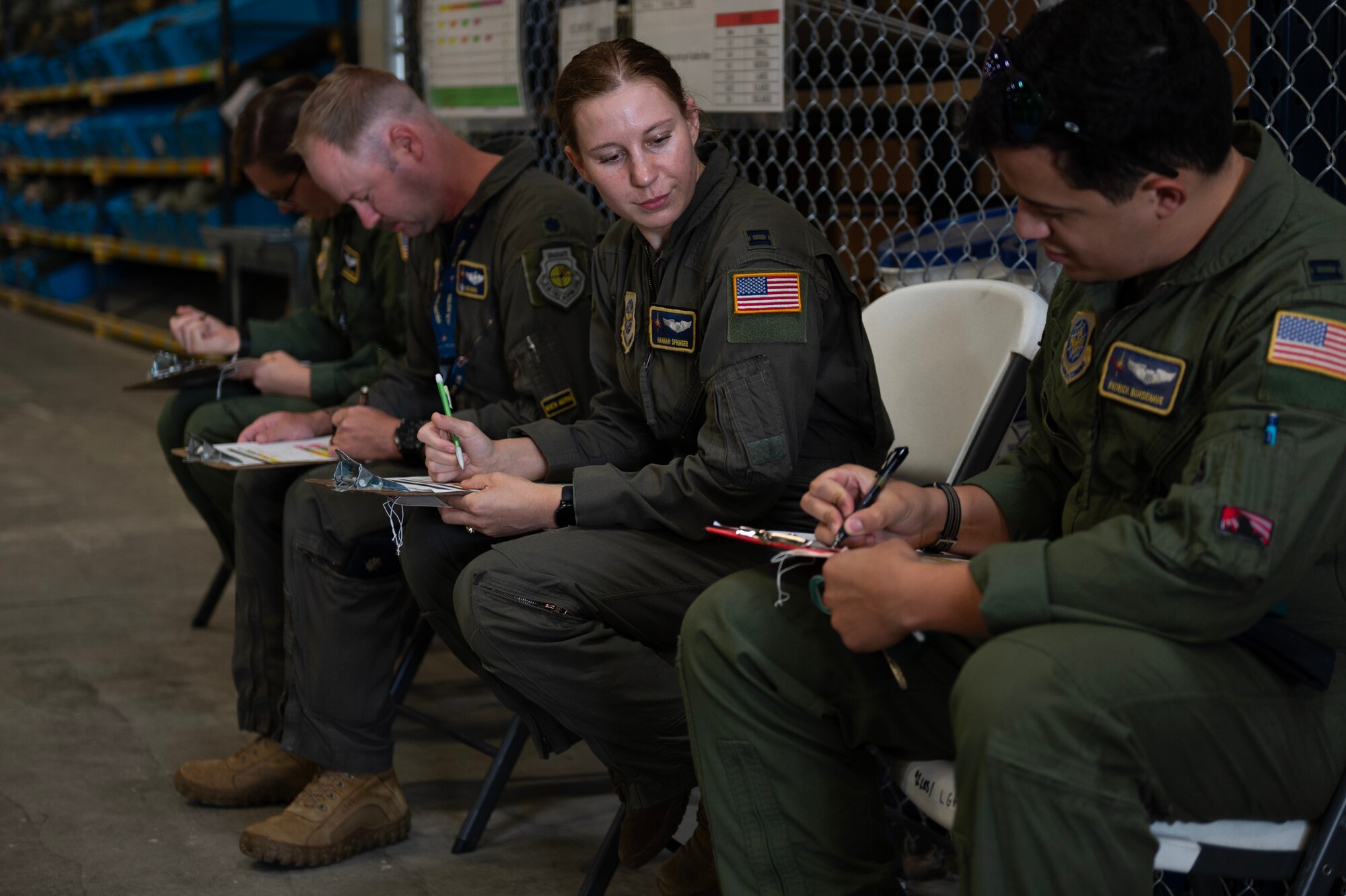 Airmen assigned to the 97th Air Refueling Squadron fill out deployment bag paperwork to ensure they receive all required deployment items at Fairchild Air Force Base, Washington, Aug. 9, 2024. Airmen assigned to the 92nd Air Refueling Wing deployed outside of the normal Air Force Force Generation cycle as part of U.S. force posture changes in the U.S. Central Command area of responsibility to mitigate the possibility of regional escalation. (U.S. Air Force photo by Senior Airman St Marks)