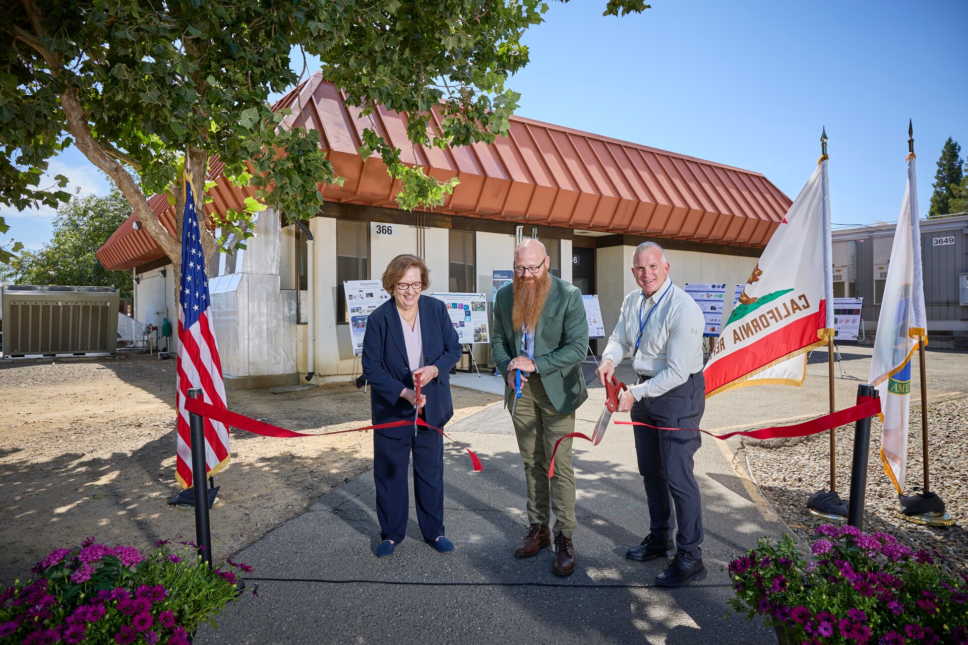 Three DOD leaders cut the ribbon on the opening of a new high-powered computing facility for CBRN threat defense