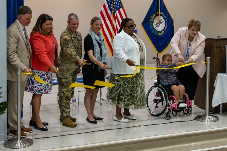 Members of the U.S. Army Corps of Engineers, Louisville District, Department of Defense Education Activity, Fort Knox students and teachers participate in a ribbon cutting ceremony for Van Voorhis Elementary School at Fort Knox, Kentucky, Aug. 13, 2024. The new school, which started construction December 2021, replaces the previous facility that was built in 1958.