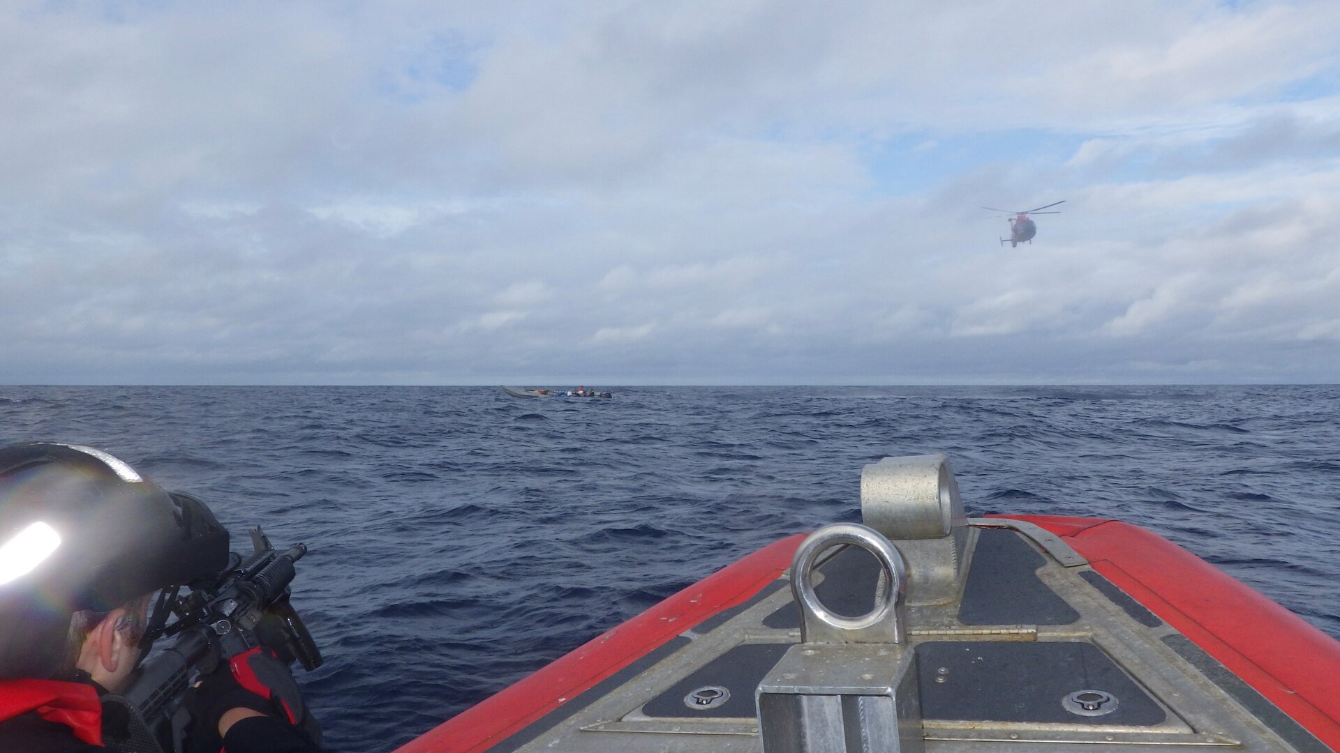 A U.S. Coast Guard Cutter Escanaba (WMEC 907) boat crew, Coast Guard law enforcement detachment 107, and Coast Guard Helicopter Interdiction Tactical Squadron aircrew interdict a go-fast vessel in the Eastern Pacific Ocean, Aug. 3, 2024. The crew of USCGC Escanaba offloaded more than 3,400 pounds of cocaine and 4,410 pounds of marijuana with a combined assessed street value of approximately $50 million in Port Everglades, Florida, Aug. 23, 2024. (U.S. Coast Guard photo by Petty Officer 2nd Class Samuel Handy)