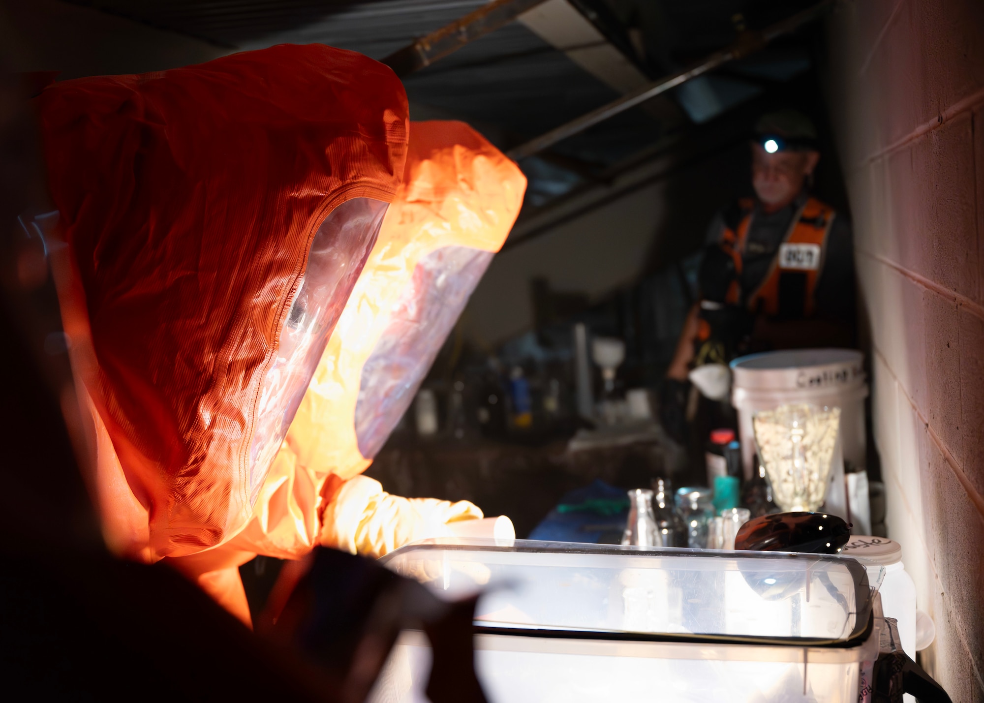 Acosta Radhames, 17th Civil Engineer Squadron firefighter, identifies hazardous material at the Spur Arena, San Angelo, Texas, Aug. 27, 2024. The 17th Civil Engineer Squadron swiftly identified the simulated hazardous material, which could be chemical, biological, radiological, or nuclear. (U.S. Air Force photo by Senior Airman Sarah Williams)