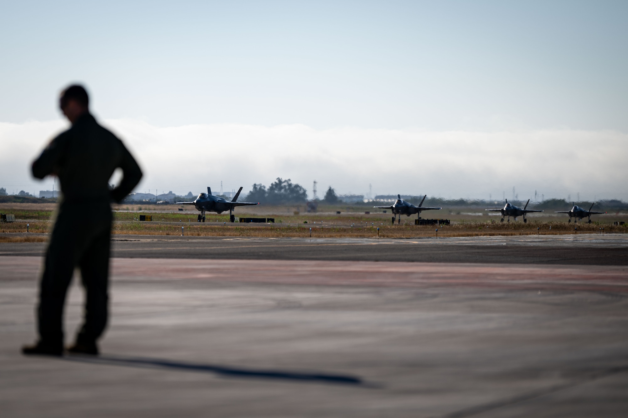 A U.S. Air Force F-35A Lightning II taxis down a runway at Santa Maria, Callifornia, during Exercise Agile Flag 24-3, Aug. 5, 2024. During AGILE FLAG 24-3, the 23rd Wing provided the Air Expeditionary Wing leadership element, the Command-and-Control Force Element, and the Airbase Squadron at two separate locations exercising rapid insertion into theaters, establishing logistics and communications with theater C2, receipt of follow-on forces, mission generation, and combat power projection across all domains, while making critical decisions needed to remain agile. (U.S. Air Force photo by 2nd Lt. Benjamin Williams)