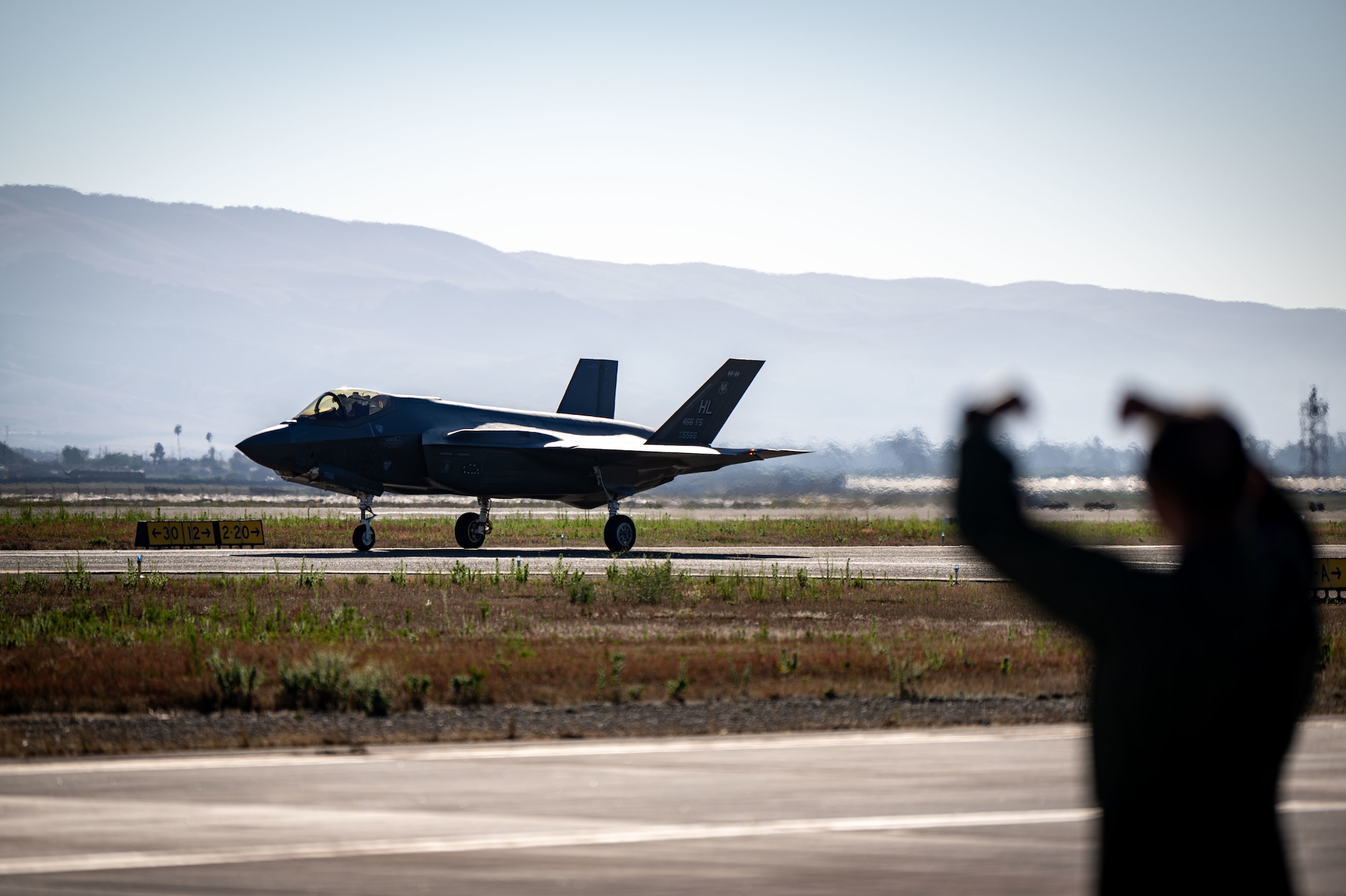 A U.S. Air Force F-35A Lightning II taxis down the runway during Exercise Agile Flag 24-3 at Santa Maria, California, during Exercise Agile Flag 24-3, Aug. 5, 2024. AGILE FLAG 24-3 is an Air Combat Command certification exercise that tested the 23rd Wing’s ability to generate combat air power while continuing to move, maneuver, and sustain wing and subordinate force elements in a dynamic and contested environment. (U.S. Air Force photo by 2nd Lt. Benjamin Williams)