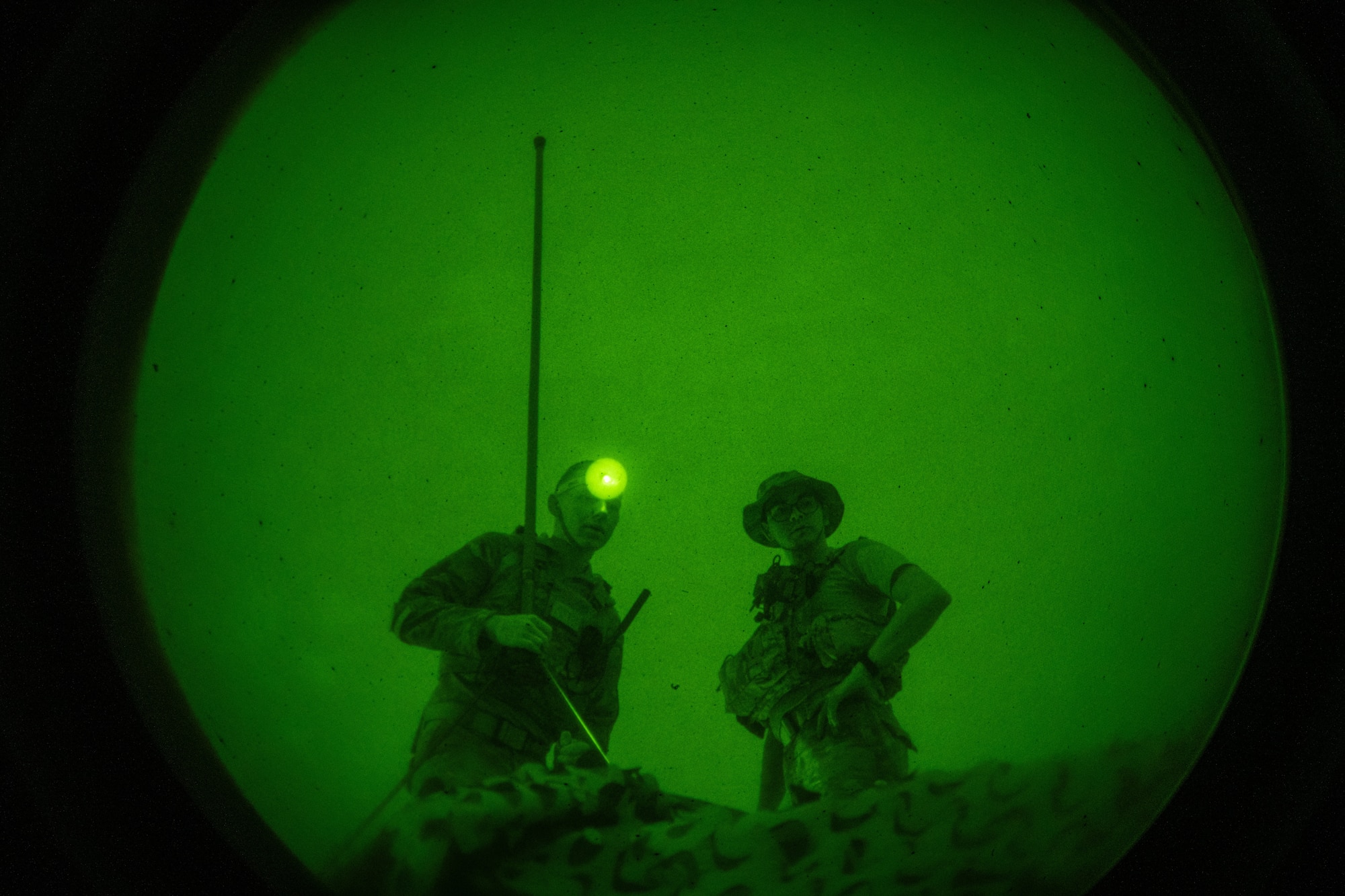 U.S. Air Force Staff Sgt. Chase Jordan-Alcaniz, 23rd Air Expeditionary Wing expeditionary communications non-commissioned officer in charge, right, and Airman 1st Class Ethan Isaacs, 23rd AEW XCOMM journeyman, left, set up communications equipment for the 338th Fighter Wing during Exercise Agile Flag 24-3 at Santa Maria, California, Aug. 4, 2024. This exercise provided more of a realistic representation of near peer conflict to prepare the wing to meet strategic objectives in any theater for future deployments, while preparing today’s leaders for the rapid operational decisions and mission type orders required to win against near peer adversaries. (U.S. Air Force photo by 2nd Lt. Benjamin Williams)